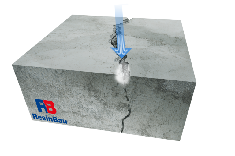 Czyszczenie rysy w betonie za pomocą sprężonego powietrza.